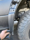 Mondo Mudguard Big Tire Kit installed on 2019+ Sprinter with large wheels.