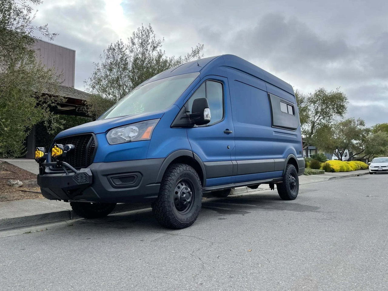 Blue Transit van equipped with Stage 2 Topo 2.0 Suspension System.