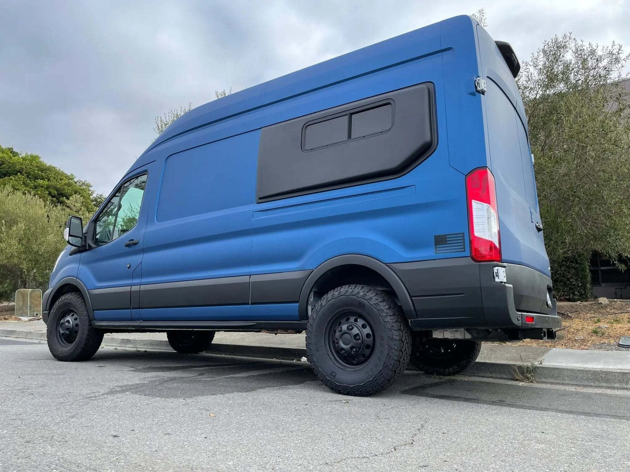 Stage 2 Topo 2.0 Suspension System on Ford Transit for enhanced control and comfort.
